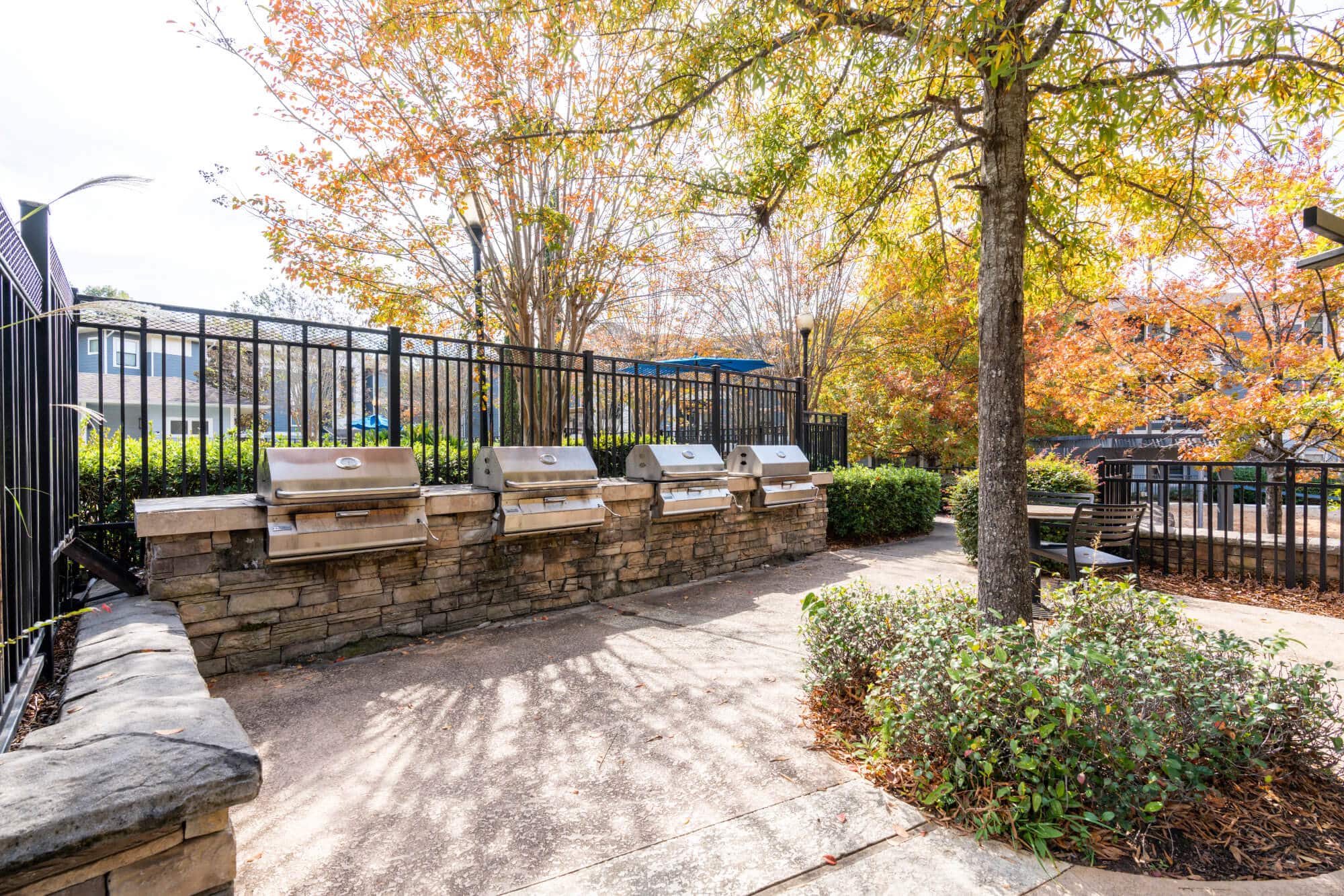 Outdoor grilling area with seating
